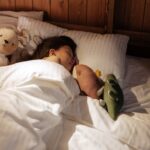 enfant qui dort suite à la lecture d'une histoire pour s'endormir